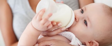 baby-drinking-milk-from-a-bottle